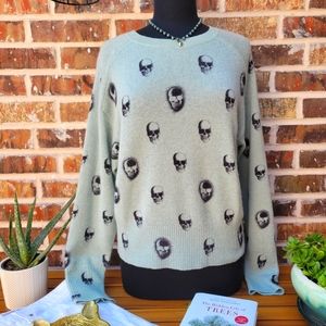 Skull cashmere sweater in a unique mint color.